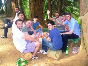 A group of men drinking beer and Vodka in the Botanical Garden of Batumi