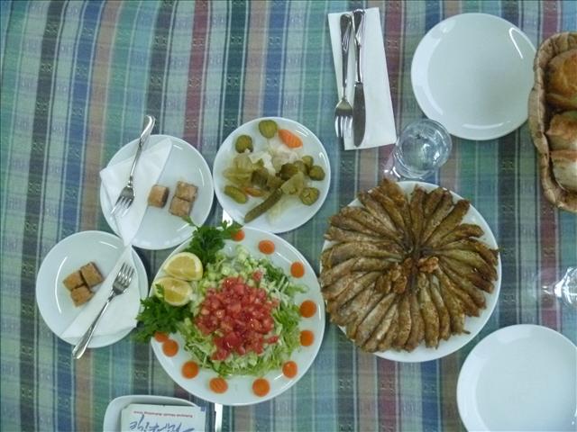 Hamsi (small fish) with Salad, Baklava and sour salad.