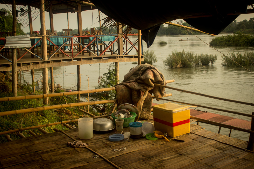 In the morning most of the restaurants start their chores by cleaning the nights aftermath. There is no rush for anything here in Laos, the country of no stress. 