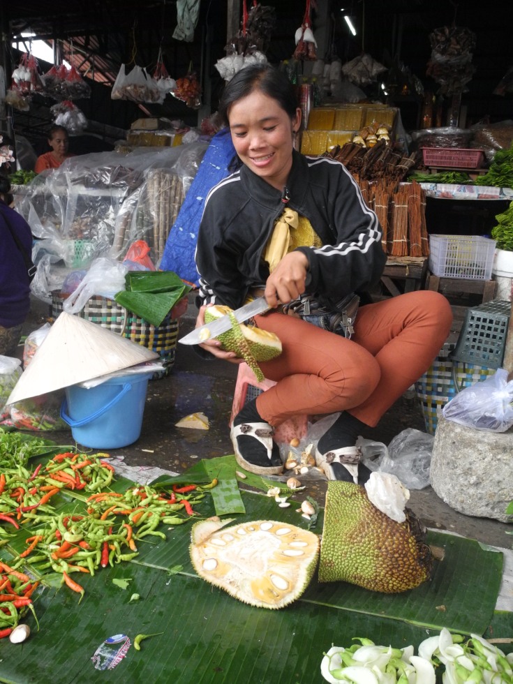 A saleswoman on the market in Laos