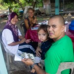 Mad Azuan, his wife Rozma and their son Iman