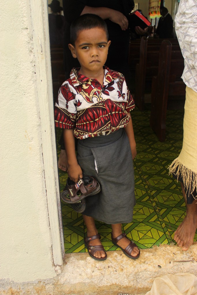 Child dressed up for church in Tonga