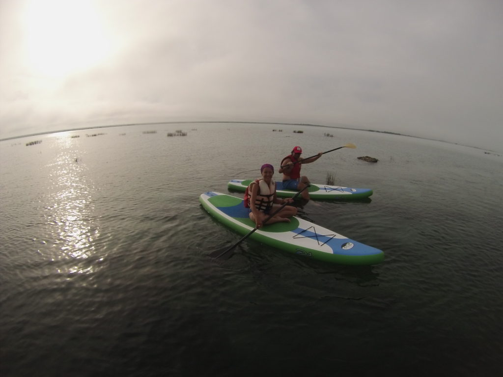 Roberto and Annika on a SUP (Stand Up Paddleboard) tour of the Bacalar Lagoon 